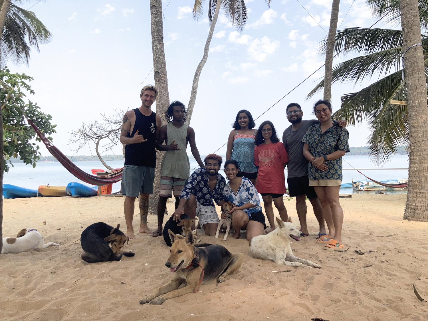 People posing for a photograph at the Shaka Surf Club