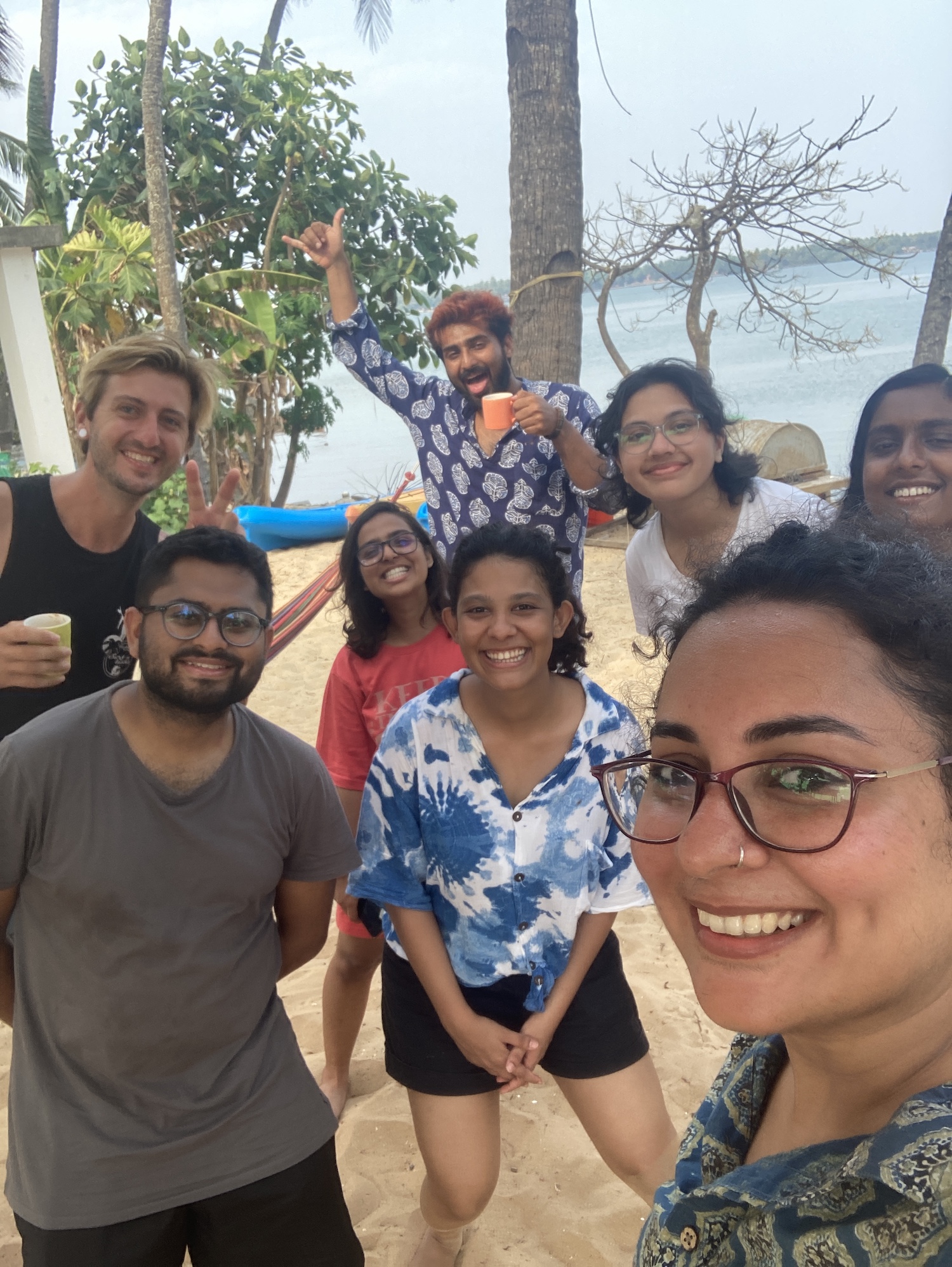 People posing for a photograph at the Shaka Surf Club